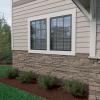 imageEkena Millwork 49quotW x 25 12quotH x 1 14quotD Acadia Ledge Stacked Stone StoneWall Faux Stone Siding Panel SandstoneBoardwalk Bay