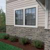 imageEkena Millwork 49quotW x 25 12quotH x 1 14quotD Acadia Ledge Stacked Stone StoneWall Faux Stone Siding Panel SandstoneLinen Graphite