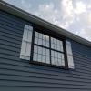 imageEkena Millwork 11 12quotW x 66quotH Rustic Two Board Spaced BoardnBatten Rough Cedar Faux Wood Shutters Per Pair Primed Tan