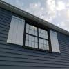 imageEkena Millwork 11W x 58H Rustic Two Board Joined BoardnBatten Rough Cedar Faux Wood Shutters wEnd Batten Per Pair Primed TanRough Cedar