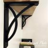imageEkena Millwork BKTM01X10X12STN 1 2 W x 10 D x 12 H Tristan Wrought Iron Bracket Single Center BraceAntiqued Pale Gold